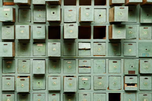 old cabinet with damaged drawers