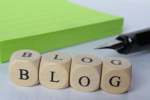 wooden cubes spelling the word "blog"